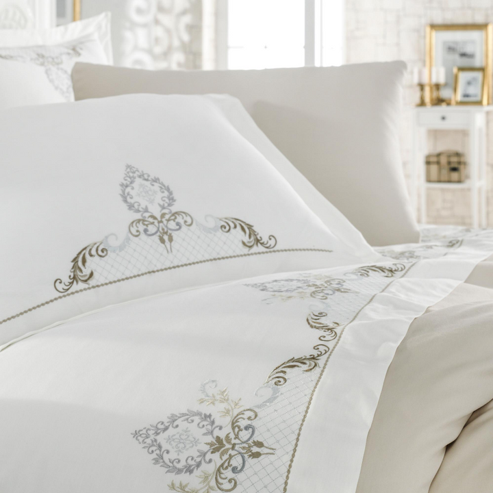 Beige duvet cover ornamented with brown and silver color, damask patterns pairs with shams